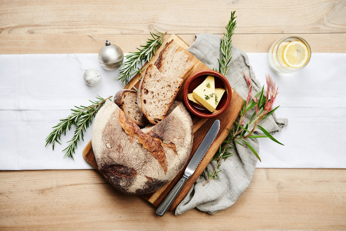 Caraway rye sour dough with confit garlic butter.